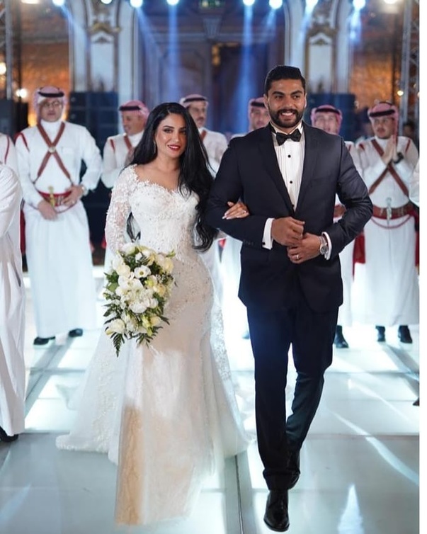 "نجاح المساعيد وزوجها عامر السردي"