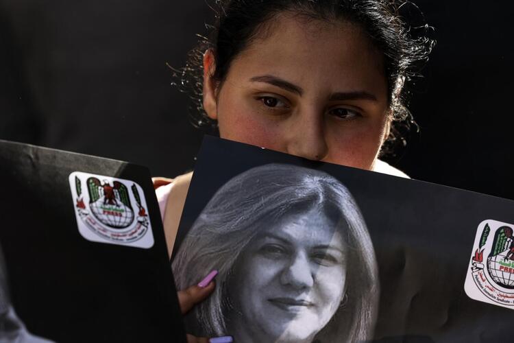 In Pictures: Funerals Held After Palestinian Journalist Killed