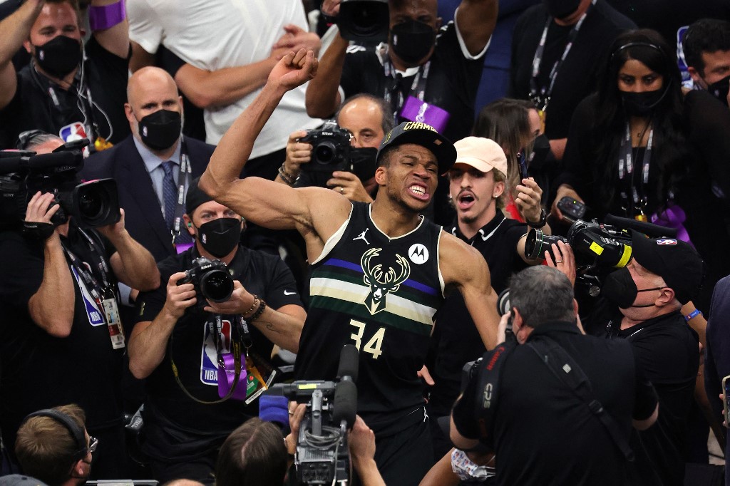 Giannis Antetokounmpo #34 of the Milwaukee Bucks celebrates after defeating the Phoenix Suns in Game Six to win the 2021 NBA Finals at Fiserv Forum on July 20, 2021 in Milwaukee, Wisconsin. (AFP)