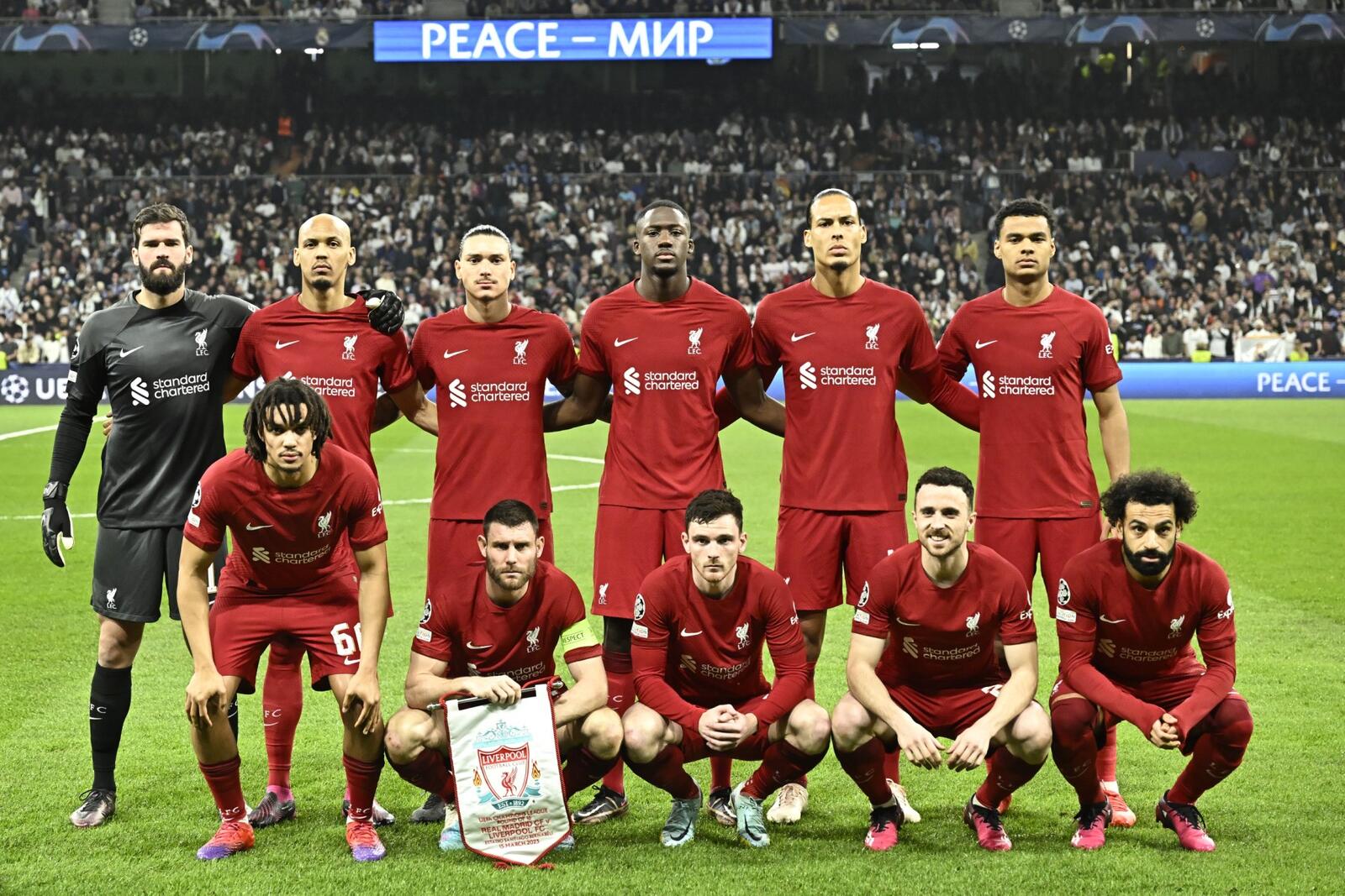 Liverpool's players pose ahead of during the UEFA Champions League last 16 second leg football match between Real Madrid CF and Liverpool FC at the Santiago Bernabeu stadium in Madrid on March 15, 2023. (Photo by JAVIER SORIANO / AFP)