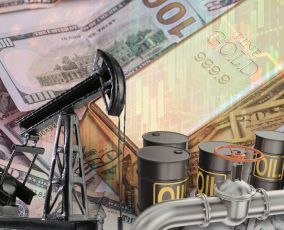 Oil rises as gold drops