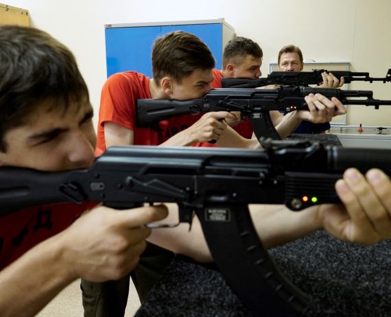 Russian teenagers shooting AKs at school training