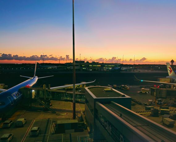 Rome,Italy-Sep.25th 2025: Leonardo da Vinci Rome Fiumicino Airport apron at sunset with airplanes