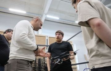Vladimir Tkachuk in arms factory
