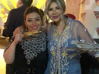 Boosy Shalabi and Ghada Ragab who chose a distinctive robe