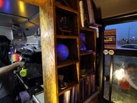 Kani Jalil, a 22-year-old Iraqi Kurdish woman who runs with her husband "The Bus Cafe Erbil" in Arbil, prepares a coffee for clients inside her cafe in Arbil, the capital of Iraq's Kurdish autonomous region, late on June 7, 2019, on the long weekend of the Eid al-Fitr holiday which marks the end of the Muslim holy month of Ramadan.  SAFIN HAMED / AFP