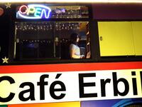 Kani Jalil, a 22-year-old Iraqi Kurdish woman who runs with her husband "The Bus Cafe Erbil" in Arbil, the capital of Iraq's Kurdish autonomous region, is pictured late on June 7, 2019, on the long weekend of the Eid al-Fitr holiday which marks the end of the Muslim holy month of Ramadan.  SAFIN HAMED / AFP