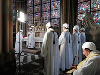 The Archbishop of Paris Michel Aupetit, holds the first mass in a side chapel two months to the day after a devastating fire engulfed the Notre-Dame de Paris cathedral on June 15, 2019, in Paris. The Notre-Dame cathedral in Paris will host its first mass on June 15, 2019. Karine PERRET / POOL / AFP