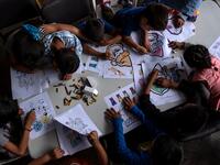 Minor migrants seeking for asylum in the United States draw in Juventud 2000 migrant shelter in Tijuana, Baja California state, on June 19, 2019, Mexico ahead of World Refugees Day. World Refugee Day is observed June 20 each year internationally to raise awareness of the situation of refugees throughout the world.  (Guillermo Arias / AFP)
