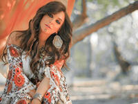 In her latest photos Fawakherji appeared in bright colored clothes and wavy hair Source sulaffawakherji Instagram