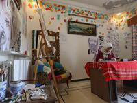 Through her cartoons, Ali has boldly challenged traditions to comment on life in the anti-regime bastion, and to condemn seeming international indifference to civilian deaths. Omar HAJ KADOUR / AFP