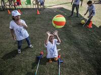 Palestinian amputee children play during a summer camp origanized by the Palestinian Children's Relief Fund (PCRF) in the town of Khan Yunis in the southern Gaza strip on August 3, 2019. SAID KHATIB / AFP