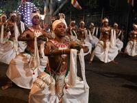 In this photograph taken on August 14, 2019 dancers perform during the "Esala Perahera" festival near the Buddhist temple of the Tooth in the ancient hill capital of Kandy, some 116 kilometres from Colombo. Lakruwan WANNIARACHCHI / AFP