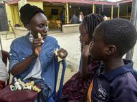 Chess teacher Omiwale Mistura (L) conducts a tutorial during a chess class at Ogolonto in Ikorodu district of Lagos on August 17, 2019. In front of chess boards in Lagos, children are busy, concentrating. PIUS UTOMI EKPEI / AFP
