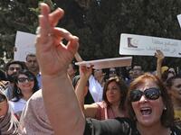 Palestinian women protest in support of women’s rights outside the prime minister’s office in the West Bank city of Ramallah on September 2, 2019, after a young Palestinian died in a case that has raised emotions. ABBAS MOMANI / AFP