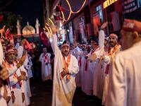 Turkish Shiite men walk during the Shi'ite Tasoua religious event, a day ahead of Ashura on September 8, 2019, in Istanbul. Ashura commemorates the killing of Imam Hussein, a grandson of the Prophet Mohammed, by armies of the caliph Yazid in 680 AD. Tradition holds that the revered imam was decapitated and his body mutilated in the Battle of Karbala. Yasin AKGUL / AFP