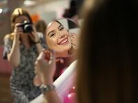 Visitors take and pose for "selfie" photographs at The Selfie Factory in Westfield London shopping centre in west London on September 11, 2019. ISABEL INFANTES / AFP
