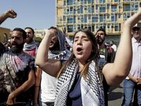 Lebanese protesters chants slogans during a demonstration in central Beirut's Martyr Square on October 6, 2019. Lebanese protested in the capital over increasingly difficult living conditions, amid fears of a dollar shortage and possible price hikes. ANWAR AMRO / AFP