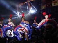 Moulin Rouge dancers perform during the celebration of the 130th anniversary of the French oldest cabaret, on October 6, 2019 in Paris.  GEOFFROY VAN DER HASSELT / AFP