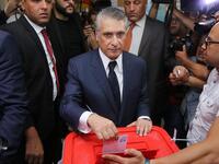Tunisia's presidential candidate Nabil Karoui casts his ballot at a polling station in the capital Tunis on October 13, 2019 during the second round of the presidential election. Tunisians began voting today in a presidential runoff pitting conservative law professor Kais Saied against media magnate Nabil Karoui, who was released from prison just days earlier. ANIS MILI / AFP