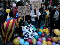 Protesters gather to participate in a "Balloons Party" demonstration called by the local Republic Defence Committees (CDR) outside the Catalan government's Interior Department on October 21, 2019 in Barcelona. Pau Barrena / AFP