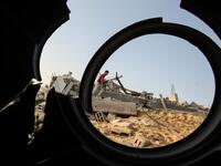 Palestinians check the remains of a house destroyed in an Israeli air strike at Khan Yunis in the southern Gaza Strip November 13, 2019. SAID KHATIB / AFP