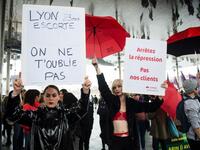 Women from the STRASS trade union (Syndicate for sexual workers) hold placards reading "Stop repression, not our clients" (R) during a protest march to condemn violence against women, on November 23, 2019 in Marseille, southern France. CLEMENT MAHOUDEAU / AFP