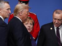 (L-R) NATO Secretary General Jens Stoltenberg, US President Donald Trump, German Chancellor Angela Merkel and Turkey's President Recep Tayyip Erdogan leave the stage after the family photo to head to attend the plenary session of the NATO summit at the Grove hotel in Watford, northeast of London on December 4, 2019. Adrian DENNIS / AFP
