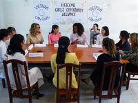 Former US First Lady Michelle Obama (C) and actress Julia Roberts (1st L) meet Vietnamese students in Can Giuoc district, Long An province on December 9, 2019 Michelle Obama and Julia Roberts visit to promote girls' education in Vietnam. Nhac NGUYEN / AFP