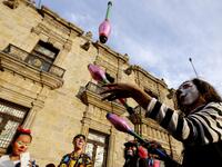 A group of clowns play during the International Clown Day in Guadalajara, Mexico, on December 10, 2019. Ulises Ruiz / AFP