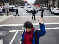 Mary Kepferle,an anti-war activist demonstrates outside the Trump International Hotel in Washington, DC, on January 4, 2020. Demonstrators are protesting the US drone attack which killed Iran's Major General Qasem Soleimani in Iraq on January 3, a dramatic escalation in spiralling tensions between Iran and the US, which pledged to send thousands more troops to the region. ANDREW CABALLERO-REYNOLDS / AFP