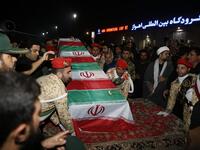 Military personnel carry the casket of Iranian commander Qasem Soleimani upon arrival at Ahvaz International Airport in Tehran on January 5, 2020. A tide of mourners packed the streets of the Iranian city of Ahvaz Sunday to pay respects to top general Qasem Soleimani, days after he was killed in a US strike. HOSSEIN MERSADI / fars news / AFP