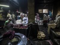 Salama and his relatives lay out the long, flowing threads, which will be used for everything from handmade shoes to rugs and drapes, and dip them in huge, piping-hot colour baths -- no gloves or masks protecting them from the dyes and chemical fumes. The workshop in Islamic Cairo has been going strong for over a hundred years. Khaled DESOUKI / AFP