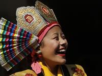 Woman in traditional dress during Tibetan New Year in Kathmandu (Twitter)