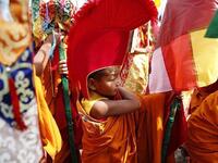 Exiled Tibetan performers sing and dance during celebrations marking the third day of the Lhosar Tibetan New Year in Kathmandu at the Boudhanath Stupa area (Twitter)
