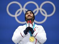 In this file photo taken on February 19, 2018 France's gold medallist Martin Fourcade reacts on the podium during the medal ceremony for the biathlon men's 15km Mass Start at the Pyeongchang Medals Plaza during the Pyeongchang 2018 Winter Olympic Games in Pyeongchang. Five-time Olympic biathlon champion Martin Fourcade announced in a statement on March 13, 2020 that he would end his career at the end of the season, after the last race which will take place on March 14 in Kontiolahti, Finland. Kirill KUDRYAV
