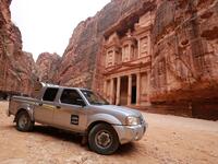 A labourer sprays disinfectant in Jordan's archaeological city of Petra south of the capital Amman on March 17, 2020, to prevent the spread of COVID-19. Khalil MAZRAAWI / afp