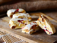 Homemade nougat bar with natural light on wooden plate on sackcloth background (Shutterstock) 