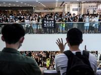 Pro-democracy demonstrators protest calling for the city's independence in Hong Kong on May 10, 2020. ISAAC LAWRENCE / AFP