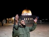 A Palestinian man prays in front of the Dome of the Rock at the al-Aqsa mosque compound, in Jerusalem's Old City on May 31, 2020, after a two-month closure due to the COVID-19 pandemic. Ahmad GHARABLI / AFP