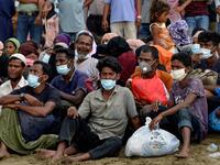 The rescued Rohingya were given temporary shelter in people's homes after they were brought ashore [Chaideer Amhyuddin/AFP]