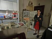 The crisis is sounding the death knell of a middle class that is sliding into the half of the population the World bank now estimates lives under the poverty line. Image Credit: AFP