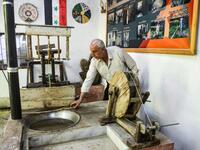 In the green hills of Deir Mama, Saud, his wife and three sons have been making silk for decades. They would raise silk worms in the spring, watching them munch on mulberry tree leaves and slowly build their thick cocoons, before spinning the thread and weaving those coils into fine cloth. MAHER AL MOUNES / AFP
