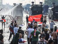 Security forces have used water cannons and tear gas to disperse more than 1,000 protesters in central Baghdad. Iraq is considered the 12th most corrupt country in the world according to Transparency International. Power cuts are rampant, water shortages are common and unemployment is high, particularly among youth. (Ahmad Al-Rubaye/ AFP)