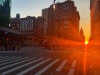 Manhattanhenge happens four times a year, when the sun rises or sets parallel to the street grid in Manhattan (Twitter)