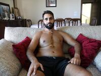 Firas Hamdan, a 33-year-old Lebanese lawyer, displays his scar. ANWAR AMRO / AFP