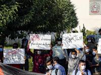 Iranian students hold banners during a protest against a US-brokered deal between Israel and the UAE to normalise relations, in front of the UAE embassy in the capital Tehran, on August 15 2020. AFP