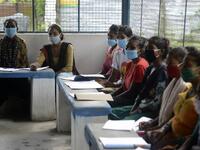 Youths from Merry view Tea Garden organisation attend a class as part of 'Tuition for Rs 10' project, origanized by Indian couple Anirban Nandy and Poulami Chaki Nandy for underprivileged students unable to assist online classes at Hatighisa village, some 26 km from Siliguri, on September 1, 2020, as schools remain closed due the Covid-19 coronavirus pandemic. DIPTENDU DUTTA / AFP
