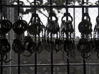 Handcuffs hang from a railing during a search operation at the maximum security prison in Izalco, Sonsonate, El Salvador, on September 4, 2020. Authorities from the General Directorate of Penal Centres (DGCP) visited three Salvadorean prisons, some of maximum security, to check the situation of inmates and carry out searches amid the COVID-19 novel coronavirus pandemic. Yuri CORTEZ / AFP