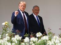 US President Donald Trump arrives with Israeli Prime Minister Benjamin Netanyahu(R), before Bahrain Foreign Minister Abdullatif al-Zayani and Foreign Minister Abdullah bin Zayed Al-Nahyan participate in the signing of the Abraham Accords where the countries of Bahrain and the United Arab Emirates recognize Israel, on the South Lawn of the White House in Washington, DC, September 15, 2020.